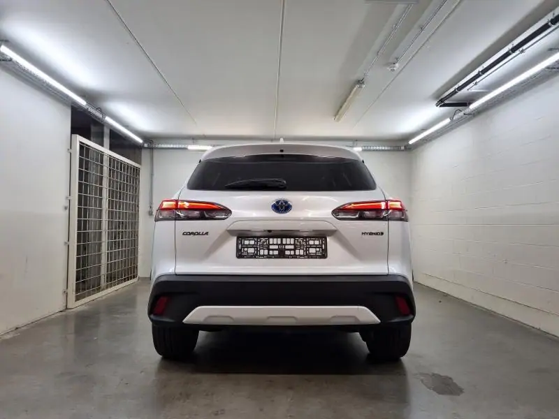 Occasie Toyota Corolla cross SUV 2.0 Hybrid 2WD CVT Style LHD 089 - WHITE PEARL MC 8