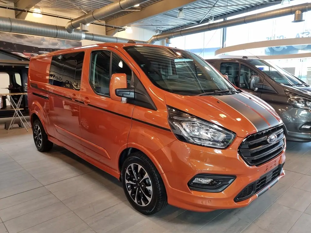 Occasie Ford Transit custom 320L Multi use: bestelwagen met dubbele cabine L2 Sport M6 2 BYO - Metaalkleur: Orange Glow 1